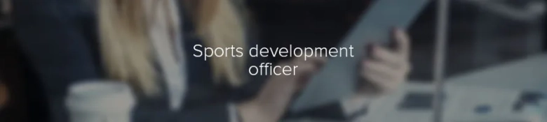 Blurred image of a person at a desk with the text "Sports development officer" overlaying.