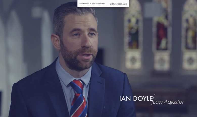 Professional portrait of Ian Doyle, a senior loss adjustor at OSG, with a name caption, wearing a suit and tie.