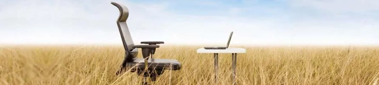 office desk and chair in a field