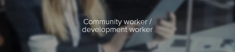 Blurred image of a person in a professional setting with a laptop, emphasizing the text "Community worker / development worker"