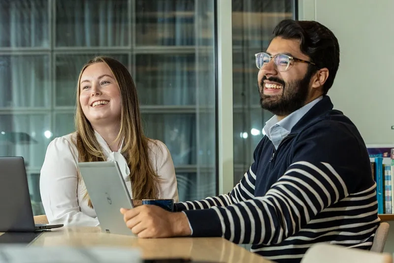 man and woman laughing 