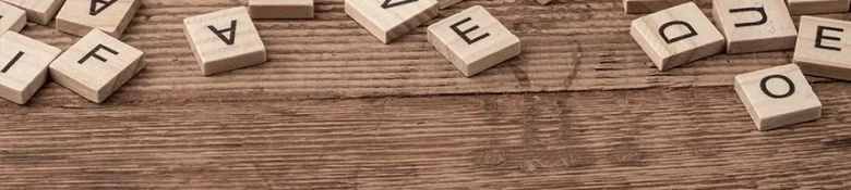 Scrabble letters on table