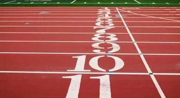 Image of a starting line on a running track 